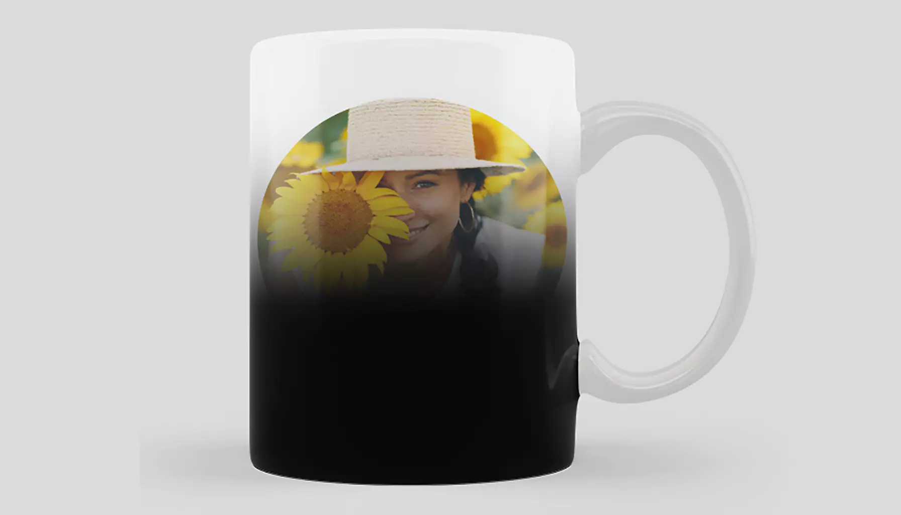 Colour-changing mug, also known as a magic mug, revealing a hidden design when filled with a hot beverage - banner