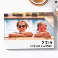 Hardcover photo book titled '2023 Our Highlights' featuring a cover image of two children wearing swimming goggles and leaning on the edge of a pool. Ideal for preserving memories, this photobook makes a perfect gift for various occasions such as Christmas, birthdays, and baby showers.