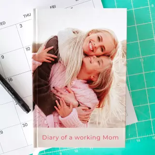 Image of a personalised diary from RapidStudio, featuring a custom cover with chosen photos or designs, ideal for organising and capturing daily memories.